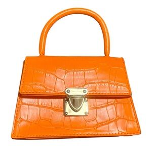 Neon orange mini bag with detachable gold tone crossbody chain
